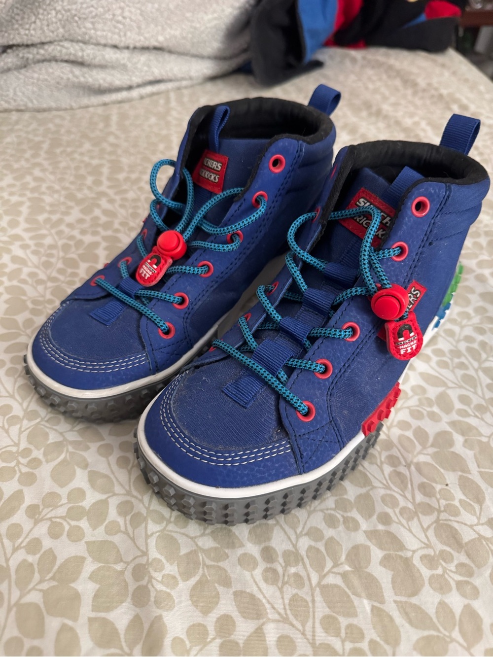 Skechers Kids Blue High-Top Sneakers with Red Accents and Teal Laces